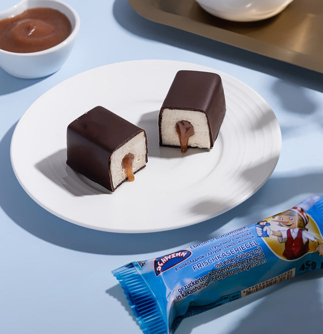Fresh cheese bar filled with a sweetened condensed milk , frozen